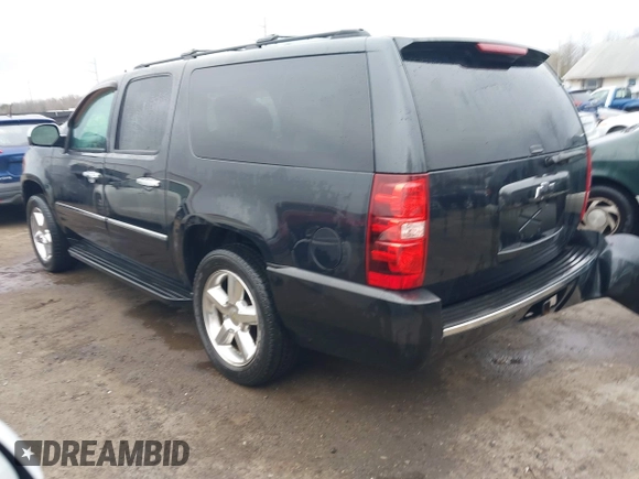2012 Chevrolet Suburban LTZ with VIN 1GNSKKE74CR257156, listed as a IAAI auction lot 41486869 with 168,049 mi miles. Bid and sale history available at carsss.com. Image 3.