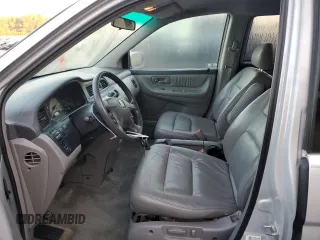 2003 Honda Odyssey EX-L with VIN 5FNRL18943B159553, listed as a Copart auction lot 72025294 with 182,942 mi miles and Salvage Title. Bid and sale history available at DreamBid. Image 7.