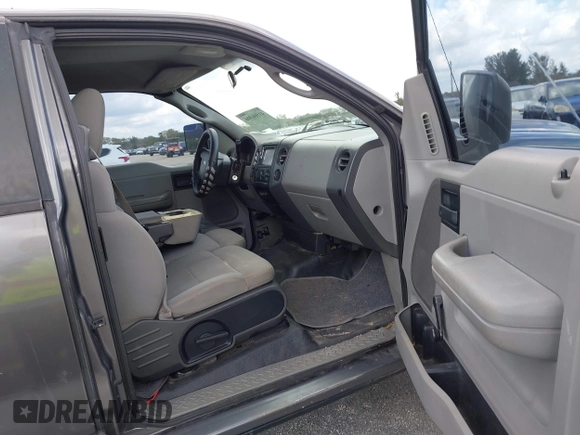 2007 Ford F-150 STX with VIN 1FTRX14W97FB49702, listed as a IAAI auction lot 41566306 with 236,003 mi miles. Bid and sale history available at carsss.com. Image 5.