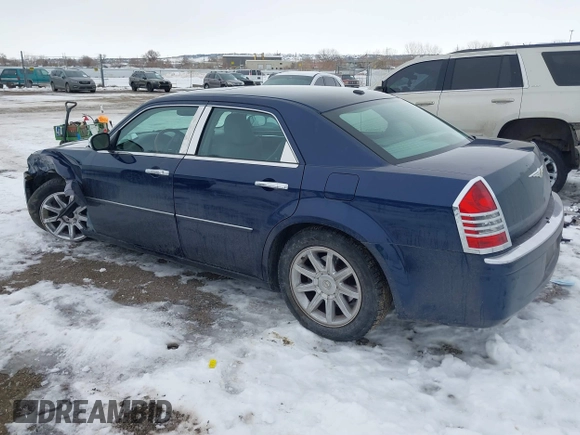 2006 Chrysler 300 C with VIN 2C3LA63H96H289693, listed as a IAAI auction lot 41308366 with 128,814 mi miles. Bid and sale history available at carsss.com. Image 3.
