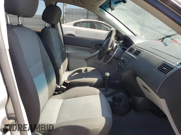 2007 Ford Focus S z VIN 1FAFP34N97W264411, wystawiony jako Copart lot #53251655 z przebiegiem 159 516 mil mil oraz Szkoda całkowita • Salvage title. Historia ofert i sprzedaży dostępna na DreamBid. Obrazek 7.