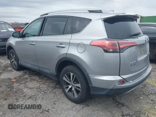 2018 Toyota RAV4 XLE with VIN 2T3WFREV4JW486939, listed as a IAAI auction lot 42355448 with 133,655 mi miles and . Bid and sale history available at DreamBid. Image 3.