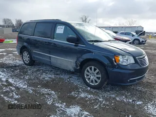 2013 Chrysler Town & Country Touring with VIN 2C4RC1BGXDR613852, listed as a IAAI auction lot 40973841 with 150,234 mi miles. Bid and sale history available at carsss.com. Image 1.