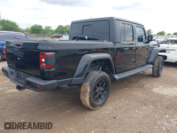 2021 Jeep Gladiator Freedom z VIN 1C6HJTAG4ML586999, wystawiony jako IAAI lot #41911751 z przebiegiem 81 030 mil mil oraz . Historia ofert i sprzedaży dostępna na DreamBid. Obrazek 4.