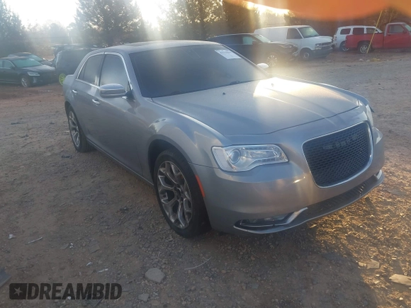 2016 Chrysler 300 with VIN 2C3CCAPG6GH167731, listed as a IAAI auction lot 41779615 with 127,679 mi miles. Bid and sale history available at carsss.com. Image 1.
