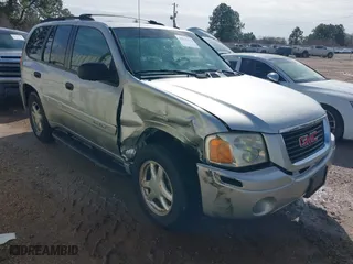 2005 GMC Envoy SLE with VIN 1GKDS13S252284455, listed as a IAAI auction lot 41455172 with 171,559 mi miles. Bid and sale history available at carsss.com. Image 1.