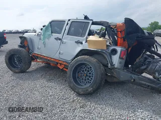 2015 Jeep Wrangler Unlimited Freedom with VIN 1C4BJWDG3FL682296, listed as a IAAI auction lot 42275536 with Not provided miles and . Bid and sale history available at DreamBid. Image 3.