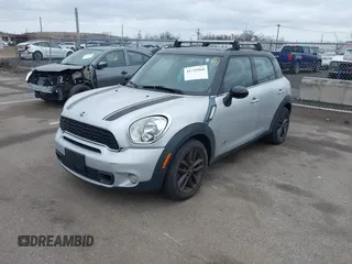2012 MINI Countryman S with VIN WMWZC5C5XCWL55727, listed as a IAAI auction lot 41729968 with 103,935 mi miles and . Bid and sale history available at DreamBid. Image 2.