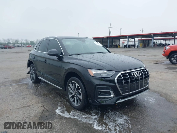 2021 Audi Q5 Premium Plus with VIN WA1BAAFY3M2013760, listed as a IAAI auction lot 41904740 with 64,829 mi miles and . Bid and sale history available at DreamBid. Image 1.