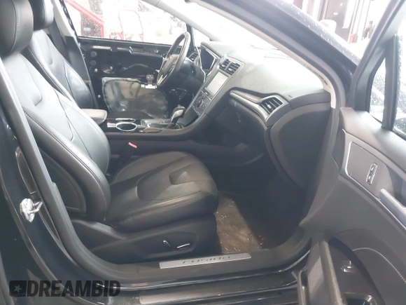 2013 Ford Fusion Titanium Hybrid with VIN 3FA6P0RU4DR281789, listed as a IAAI auction lot 41909115 with 161,008 mi miles and . Bid and sale history available at DreamBid. Image 5.