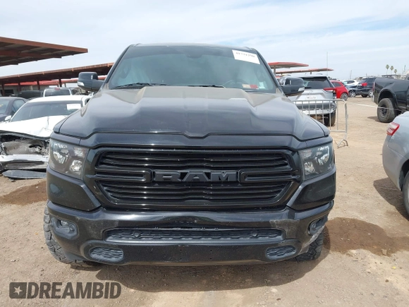 2019 Ram 1500 Big Horn/Lone Star with VIN 1C6SRFFT0KN751969, listed as a IAAI auction lot 41731290 with 127,111 mi miles. Bid and sale history available at carsss.com. Image 12.