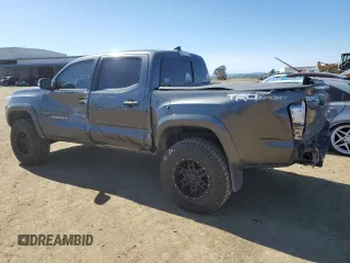 2017 Toyota Tacoma SR5 with VIN 3TMAZ5CNXHM032218, listed as a Copart auction lot 49672275 with 104,244 mi miles and Salvage Title. Bid and sale history available at DreamBid. Image 2.