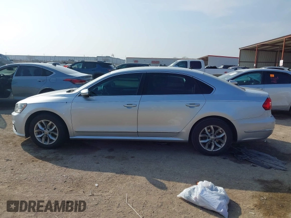 2016 Volkswagen Passat S with VIN 1VWAS7A30GC032422, listed as a IAAI auction lot 41533743 with 176,142 mi miles and . Bid and sale history available at DreamBid. Image 14.