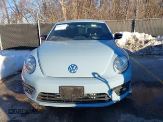 2014 Volkswagen Beetle Turbo R-Line with VIN 3VWVT7AT9EM661347, listed as a IAAI auction lot 41336295 with 61,068 mi miles and . Bid and sale history available at DreamBid. Image 12.