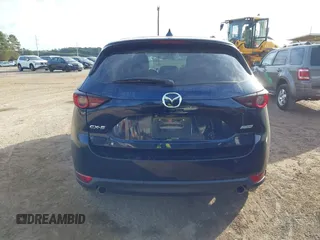 2018 Mazda CX-5 Touring z VIN JM3KFACM0J1389057, wystawiony jako IAAI lot #40922679 z przebiegiem 140 026 mil mil oraz . Historia ofert i sprzedaży dostępna na DreamBid. Obrazek 17.