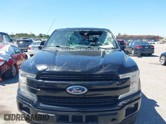 2018 Ford F-150 XL with VIN 1FTFW1EG9JFC63669, listed as a IAAI auction lot 41748012 with 143,584 mi miles. Bid and sale history available at carsss.com. Image 6.