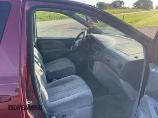 1999 Toyota Sienna LE with VIN 4T3ZF13C5XU141279, listed as a Copart auction lot 64366315 with 218,223 mi miles and Clean title. Bid and sale history available at DreamBid. Image 5.