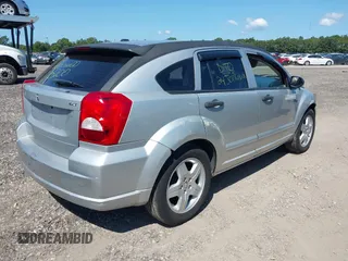 2008 Dodge Caliber SXT with VIN 1B3HB48B48D594124, listed as a IAAI auction lot 40282351 with 142,615 mi miles. Bid and sale history available at carsss.com. Image 4.