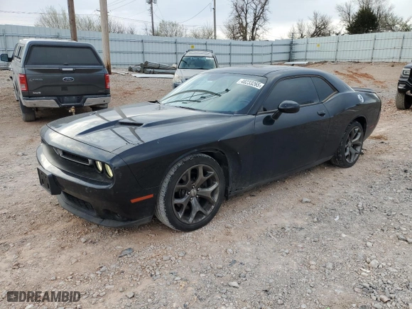 2015 Dodge Challenger SXT Plus with VIN 2C3CDZBG2FH900746, listed as a Copart auction lot 48233265 with 132,438 mi miles and Salvage Title. Bid and sale history available at carsss.com. Image 1.