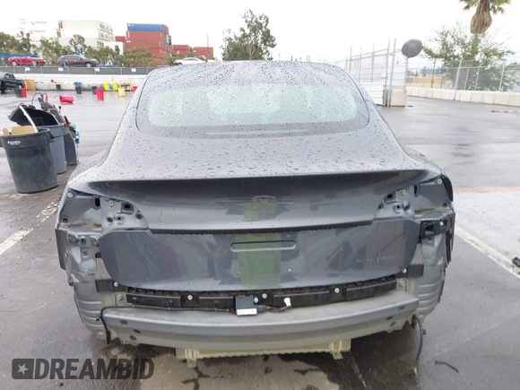 2018 Tesla Model 3 Long Range Battery with VIN 5YJ3E1EB7JF114305, listed as a IAAI auction lot 41765994 with 76,945 mi miles and . Bid and sale history available at DreamBid. Image 17.