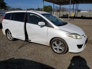 2010 Mazda 5 Sport with VIN JM1CR2WL3A0362695, listed as a Copart auction lot 54591605 with 188,534 mi miles and Salvage title. Bid and sale history available at DreamBid. Image 4.
