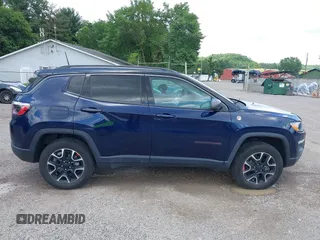 2021 Jeep Compass Trailhawk with VIN 3C4NJDDB0MT590442, listed as a IAAI auction lot 42543530 with 66,669 mi miles and . Bid and sale history available at DreamBid. Image 13.