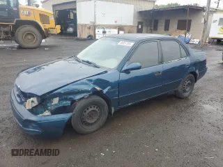 1998 Toyota Corolla VE with VIN 2T1BR18EXWC015463, listed as a Copart auction lot 60057355 with Not provided miles and Salvage title. Bid and sale history available at DreamBid. Image 1.