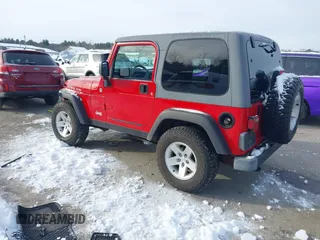 2005 Jeep Wrangler Rubicon with VIN 1J4FA69S25P316085, listed as a IAAI auction lot 41503034 with 57,252 mi miles. Bid and sale history available at carsss.com. Image 3.