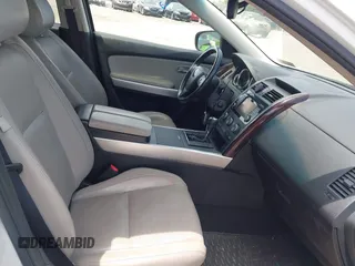 2014 Mazda CX-9 Grand Touring z VIN JM3TB3DV0E0436649, wystawiony jako IAAI lot #42319638 z przebiegiem 128 421 mil mil oraz . Historia ofert i sprzedaży dostępna na DreamBid. Obrazek 5.