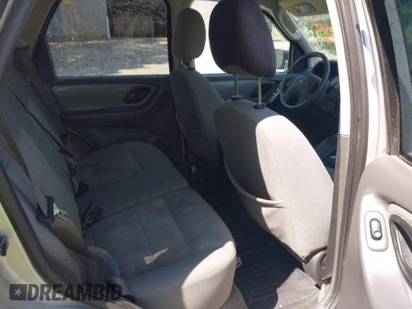 2006 Ford Escape XLT with VIN 1FMYU93106KA12173, listed as a IAAI auction lot 42176724 with 219,471 mi miles and . Bid and sale history available at DreamBid. Image 8.