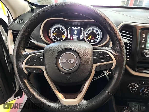 2015 Jeep Cherokee Sport with VIN 1C4PJMAB8FW685146, listed as a IAAI auction lot 42842417 with 130,325 mi miles and . Bid and sale history available at DreamBid. Image 7.