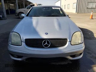2002 Mercedes-Benz SLK-Class 2.3L Kompressor with VIN WDBKK49FX2F268683, listed as a Copart auction lot 68705174 with 132,677 mi miles and Salvage Title. Bid and sale history available at carsss.com. Image 5.