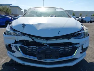 2017 Chevrolet Cruze LS z VIN 1G1BC5SMXH7181536, wystawiony jako IAAI lot #42317266 z przebiegiem 124 380 mil mil oraz . Historia ofert i sprzedaży dostępna na DreamBid. Obrazek 12.