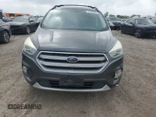2017 Ford Escape SE with VIN 1FMCU0GD6HUD28114, listed as a Copart auction lot 51626095 with 98,701 mi miles and Clean Title. Bid and sale history available at carsss.com. Image 5.