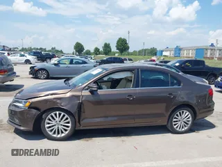 2015 Volkswagen Jetta SE with VIN 3VWD07AJ0FM214295, listed as a IAAI auction lot 42593549 with 62,720 mi miles and . Bid and sale history available at DreamBid. Image 13.