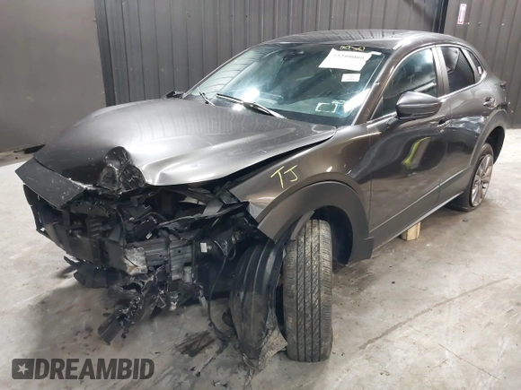 2021 Mazda CX-30 Preferred with VIN 3MVDMBCL1MM247701, listed as a IAAI auction lot 42299009 with 15,880 mi miles and . Bid and sale history available at DreamBid. Image 2.
