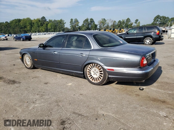 2004 Jaguar XJ with VIN SAJWA71CX4SG32785, listed as a Copart auction lot 69792134 with 183,705 mi miles and Non Repairable. Bid and sale history available at carsss.com. Image 2.