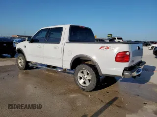 2002 Ford F-150 XLT with VIN 1FTRW08692KD89789, listed as a Copart auction lot 52621555 with 150,012 mi miles and Salvage Title. Bid and sale history available at carsss.com. Image 2.