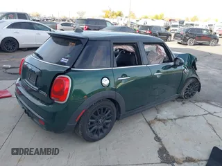 2016 MINI Cooper Hardtop 4 Door S with VIN WMWXU3C58G2D28227, listed as a IAAI auction lot 38046281 with 56,694 mi miles. Bid and sale history available at carsss.com. Image 4.