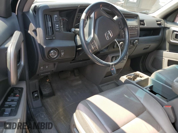2010 Honda Ridgeline RTL with VIN 5FPYK1F5XAB004153, listed as a Copart auction lot 59710535 with Not provided miles and Salvage title. Bid and sale history available at DreamBid. Image 8.