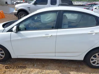 2014 Hyundai Accent GLS z VIN KMHCT4AE5EU697201, wystawiony jako IAAI lot #42157098 z przebiegiem 139 181 mil mil oraz . Historia ofert i sprzedaży dostępna na DreamBid. Obrazek 14.
