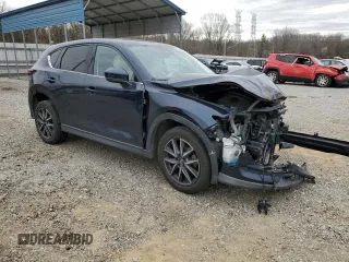 2018 Mazda CX-5 Grand Touring z VIN JM3KFBDM6J0359359, wystawiony jako Copart lot #48018105 z przebiegiem 74 227 mil mil oraz Szkody całkowita. Historia ofert i sprzedaży dostępna na DreamBid. Obrazek 4.
