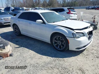 2015 Chrysler 300 with VIN 2C3CCABG9FH736013, listed as a IAAI auction lot 41646979 with 103,572 mi miles. Bid and sale history available at carsss.com. Image 1.