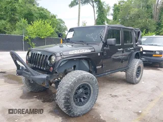 2013 Jeep Wrangler Unlimited Rubicon with VIN 1C4BJWFG5DL652050, listed as a IAAI auction lot 42451954 with 107,110 mi miles and . Bid and sale history available at DreamBid. Image 17.