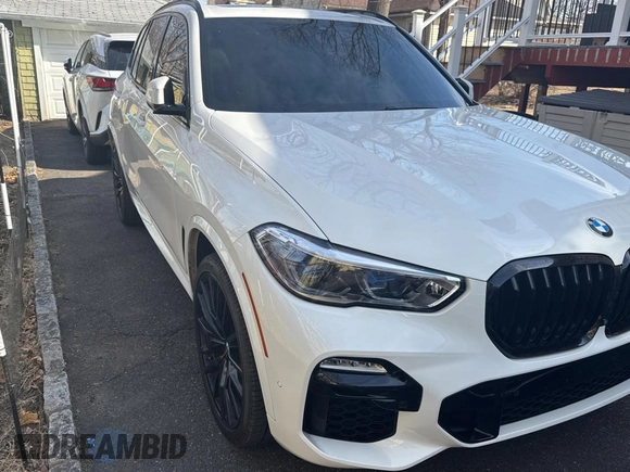 2021 BMW X5 M50i with VIN 5UXJU4C09M9H07838, listed as a Copart auction lot 47020525 with 57,200 mi miles and Clean Title. Bid and sale history available at carsss.com. Image 1.