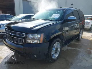 2011 Chevrolet Tahoe LS with VIN 1GNSCAE05BR380084, listed as a IAAI auction lot 42746873 with 386,755 mi miles and . Bid and sale history available at DreamBid. Image 2.
