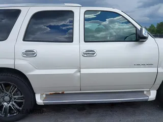 2005 Cadillac Escalade z VIN 1GYEK63N55R123817, wystawiony jako IAAI lot #42263549 z przebiegiem 297 279 mil mil oraz . Historia ofert i sprzedaży dostępna na DreamBid. Obrazek 12.