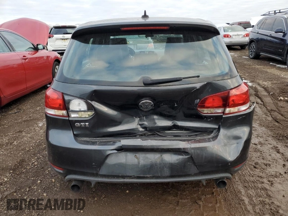 2010 Volkswagen GTI with VIN WVWHV7AJ2AW400192, listed as a Copart auction lot 86180024 with 124,705 mi miles and Salvage Title. Bid and sale history available at carsss.com. Image 6.