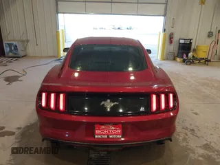 2017 Ford Mustang V6 z VIN 1FA6P8AMXH5309985, wystawiony jako IAAI lot #41501211 z przebiegiem 63 885 mil mil oraz . Historia ofert i sprzedaży dostępna na DreamBid. Obrazek 17.