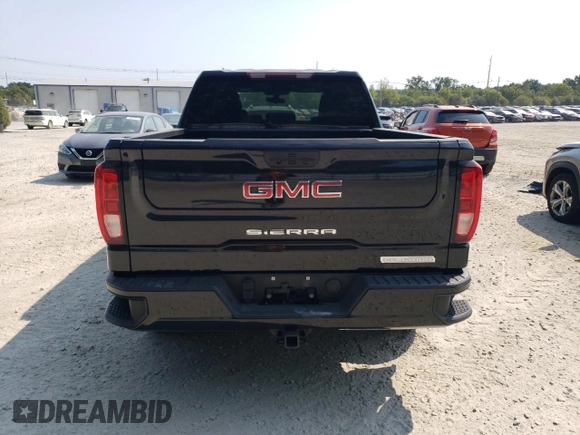 2021 GMC Sierra 1500 with VIN 1GTP9GEK1MZ410699, listed as a Copart auction lot 69913004 with 70,303 mi miles and Salvage Title. Bid and sale history available at DreamBid. Image 6.